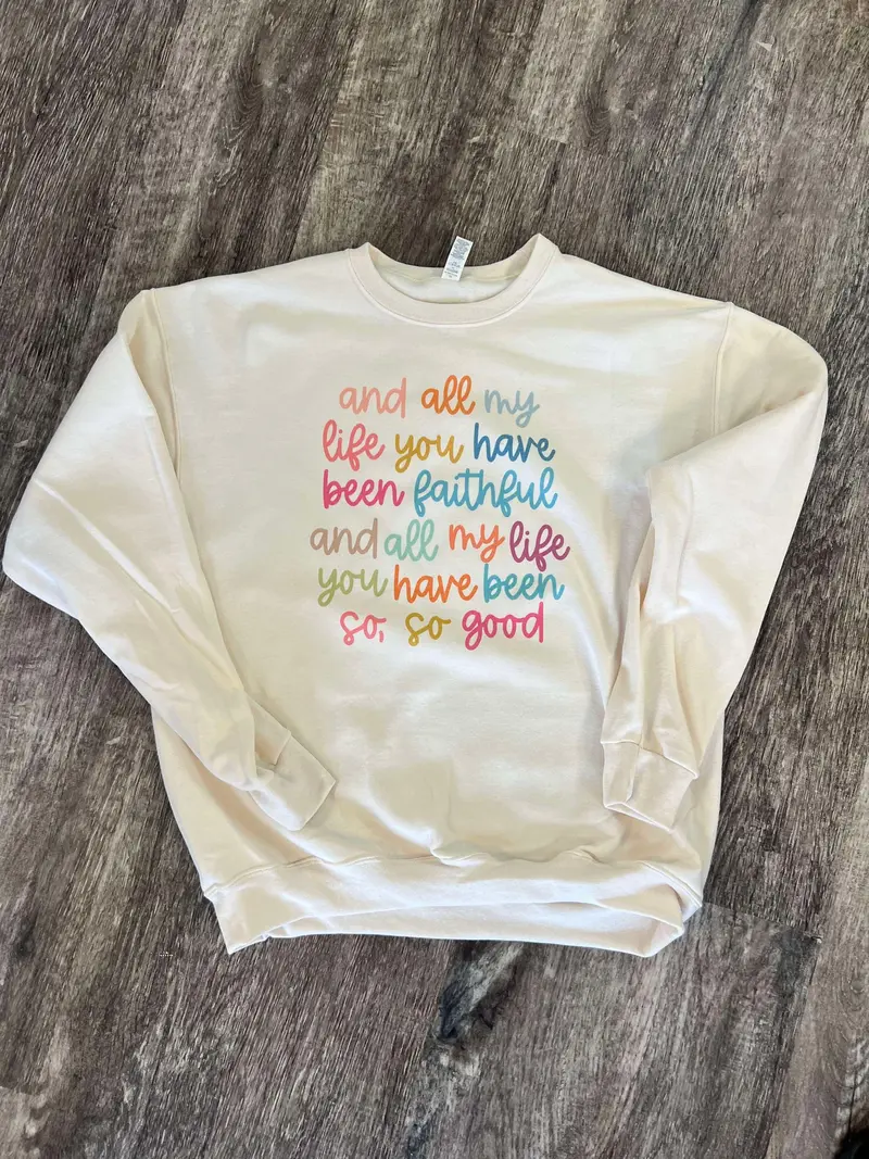 All My Life You Have Been Faithful colorful script print on cream crewneck sweatshirt