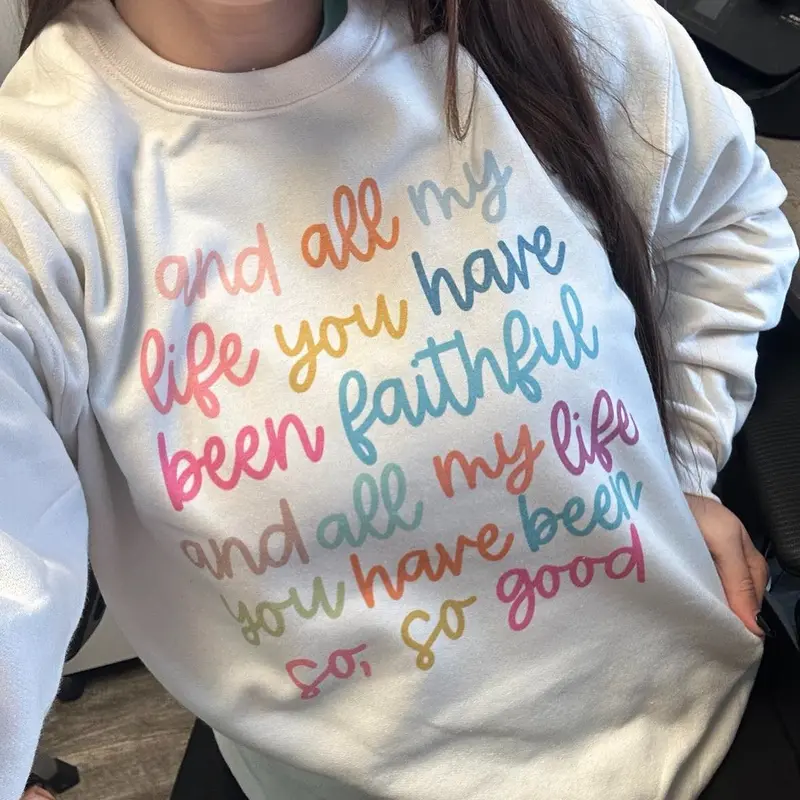 All My Life You Have Been Faithful colorful script print on cream crewneck sweatshirt