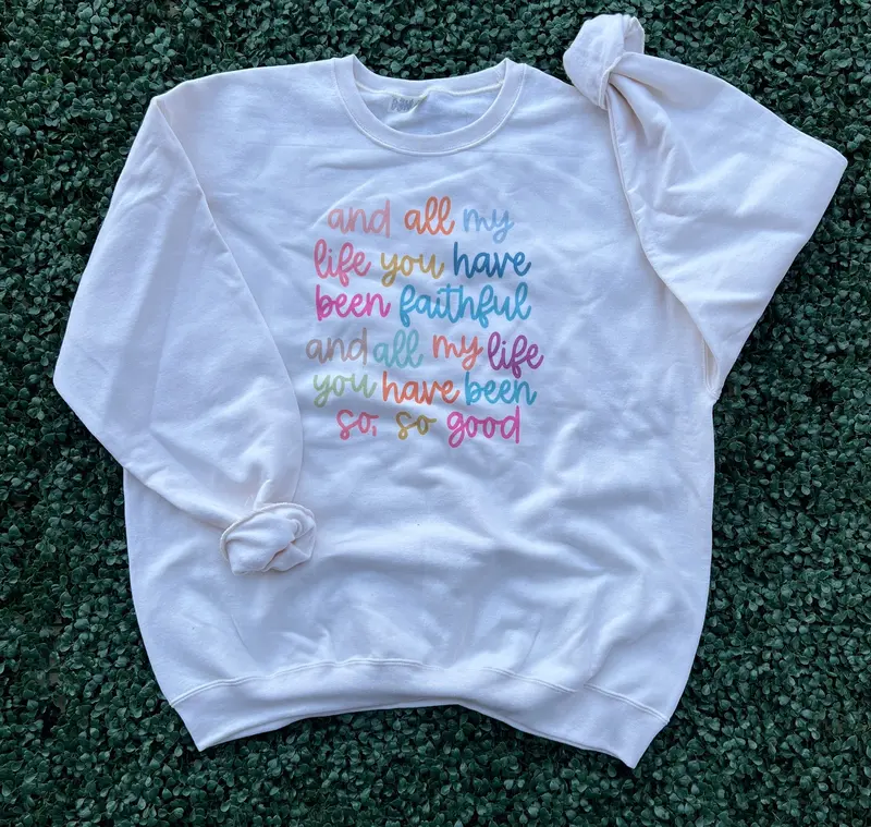All My Life You Have Been Faithful colorful script print on cream crewneck sweatshirt
