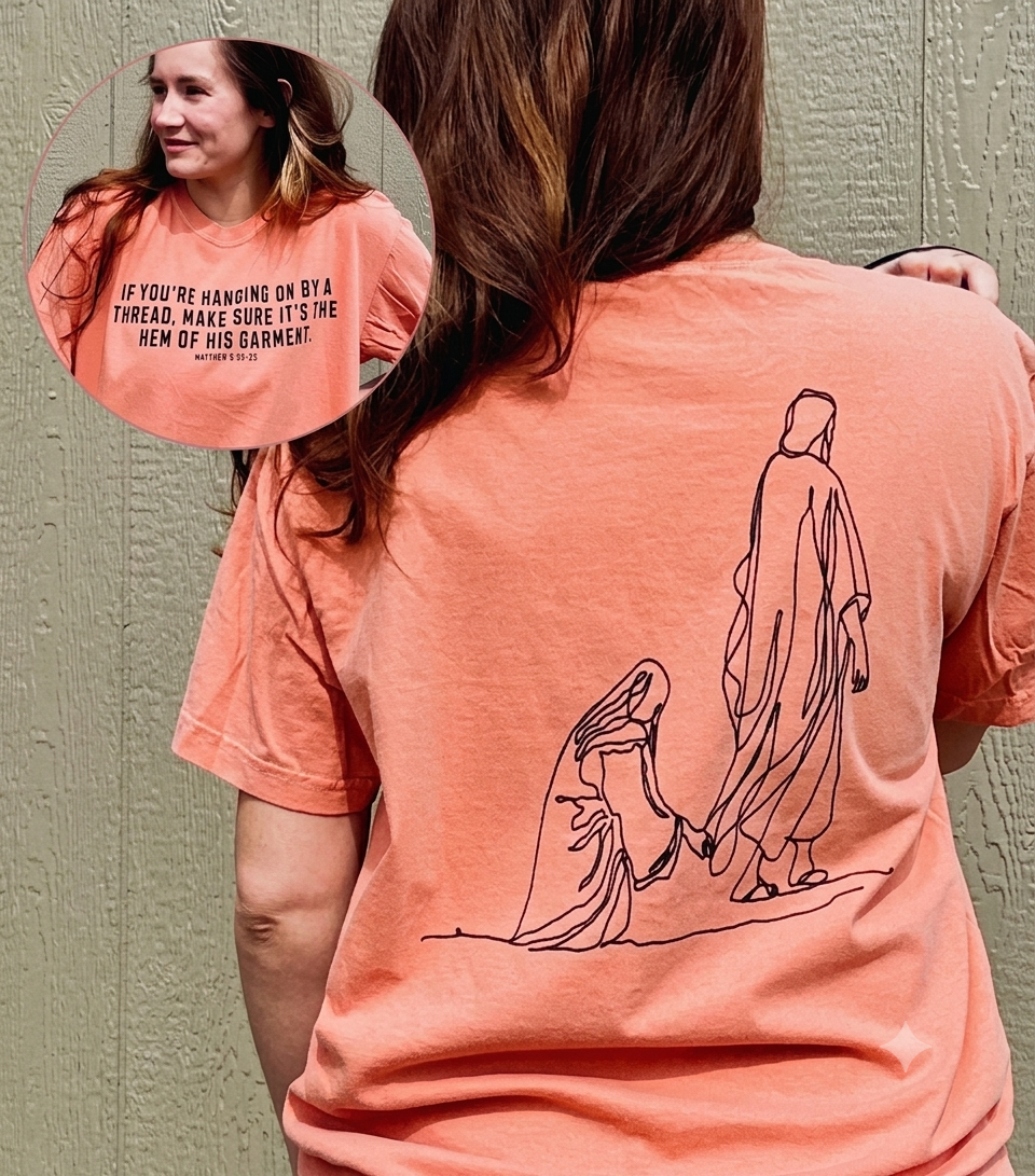 Hang By The Hem Of His Garment Comfort Colors tee, front verse text and back line-art of the woman touching Jesus' garment