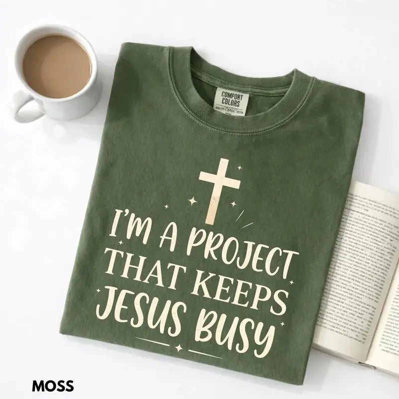 I'm A Project That Keeps Jesus Busy Christian graphic shirt