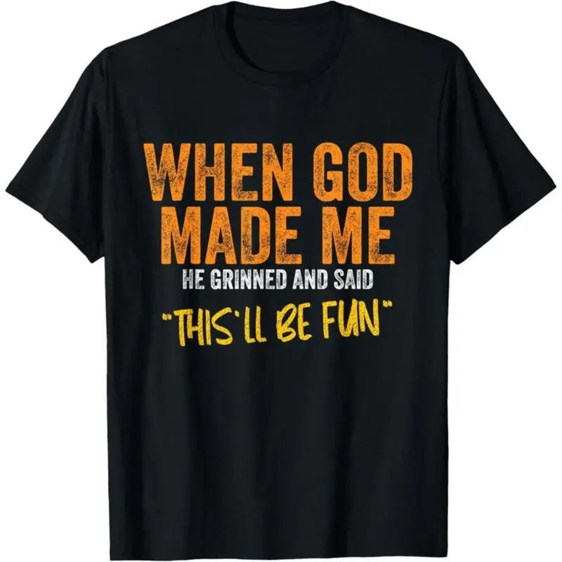 When God Made Me He Grinned black tee