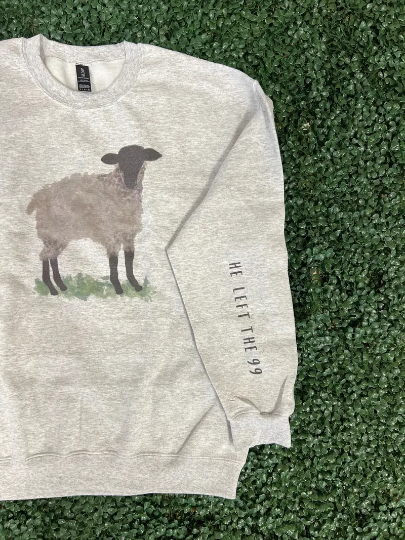 He Left The 99 sweatshirt with watercolor sheep on the chest and sleeve print on ash gray