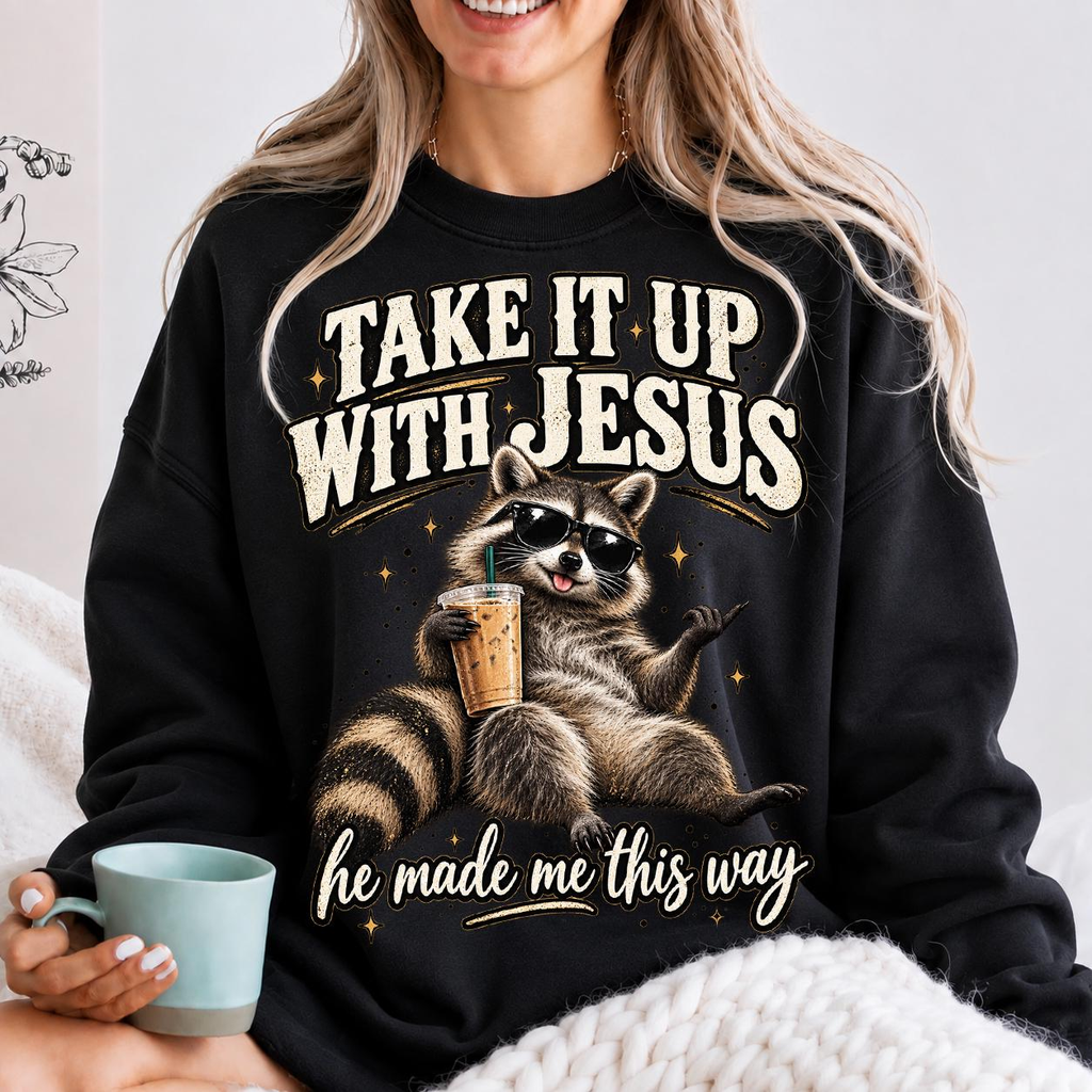 Take It Up With Jesus He Made Me This Way shirt, funny raccoon in sunglasses lounging with an iced coffee