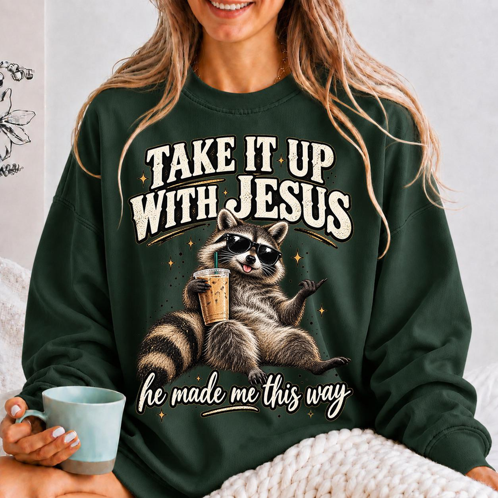 Take It Up With Jesus He Made Me This Way shirt, funny raccoon in sunglasses lounging with an iced coffee