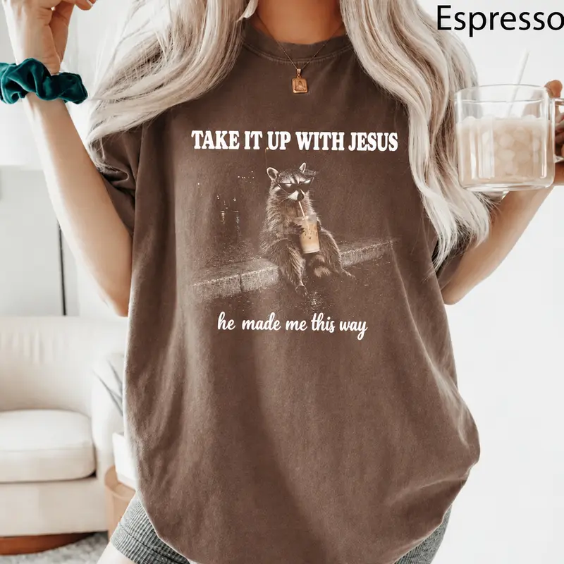 Take It Up With Jesus raccoon shirt, grunge raccoon in sunglasses sipping a drink, he made me this way
